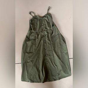 Olive green spaghetti strap maxi dress with brown buttons and pockets